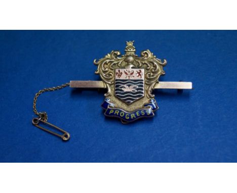 A 9ct gold and enamel school merit bar brooch.   Condition Report:  TOTAL inclusive weight 8.1g.