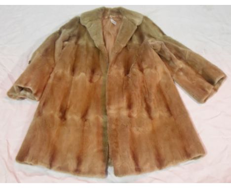 Ladies pale brown fur coat