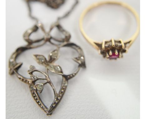 9 ct gold, ruby & white stone set cluster ring; together with an Art Nouveau white metal &  white stone set pendant