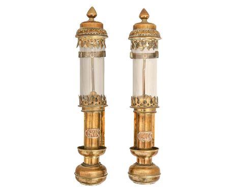 A pair of sheet brass oil lamps, applied G W R badge, glass shades, 26cm h  Good condition