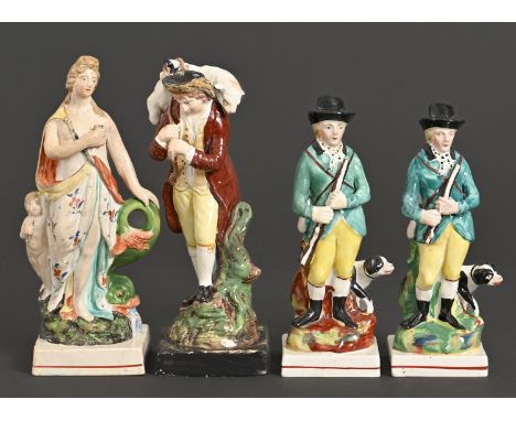A Staffordshire pearlware figure, The Lost Sheep Found, c. 1800,&nbsp;painted in polychrome, square base, 21.5cm h, another, 