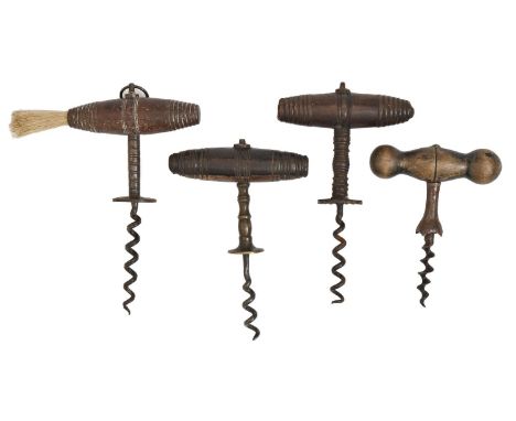Four straight pull corkscrews, 19th c,&nbsp; with fluted or other button or notched shank and turned lignum vitae or other ha