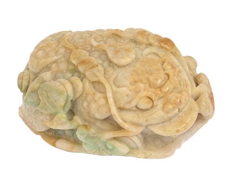 A Chinese jade pebble carving of a toad on a lotus leaf, 95mm l  Slight chip to edge of leaf