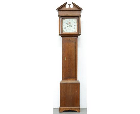An oak eight day longcase clock, [Edward] Owns Wimeswould [sic], late 18th c, the painted 12" dial with brass ringed winding 