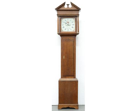 An oak eight day longcase clock, [Edward] Owns Wimeswould [sic], late 18th c, the painted 12" dial with brass ringed winding 