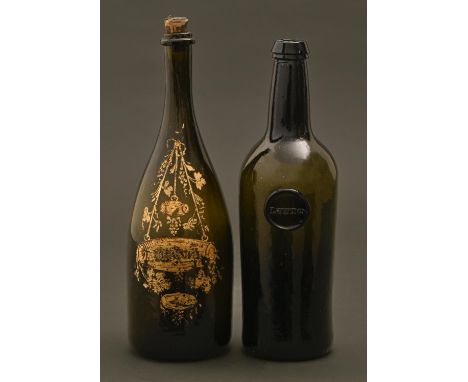 An English glass cylinder wine bottle, LUPTON seal, early 19th c, sand pontil scar, 29cm h and a contemporary decanter bottle