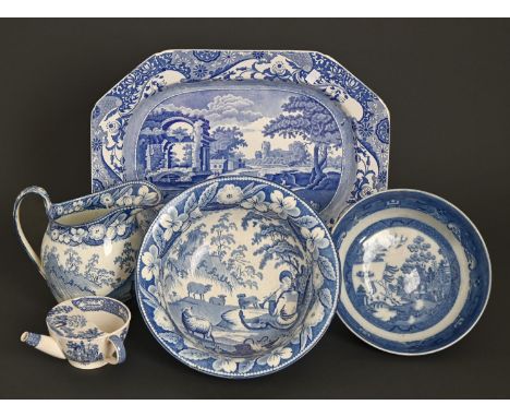 An English blue printed earthenware jug and basin, c1840, with a piping shepherd in floral border, basin 30cm diam, a contemp