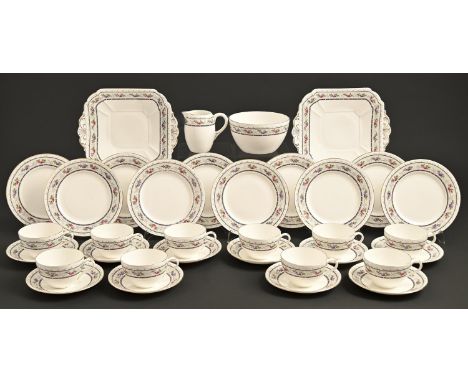 A Shelley bone china tea service, c1914, Bute / Norman shape&nbsp;decorated with floral borders, square plates, 23cm over han