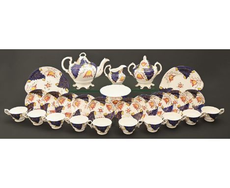 A Staffordshire bona china 'Gaudy Welsh' tea service, mid 19th c, painted with a red and yellow tulip, teapot and cover 20cm 