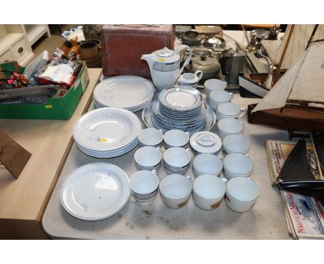 A collection of Winterling "Impulse" patterned teaware, Royal Worcester cups and other teaware