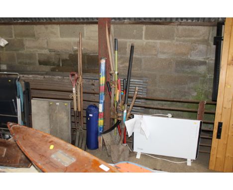 A quantity of long handle garden tools to include shovels; garden hoe; shears etc. 