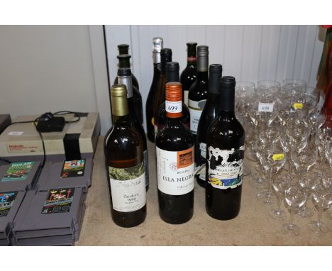 A bottle of Prosecco; a 1993 Merlot and various other wine