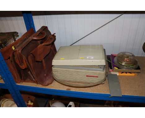 A Philips reel to reel tape player, sold as collectors item and three leather satchels