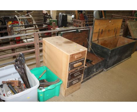 A chest of four drawers and some hand tools 