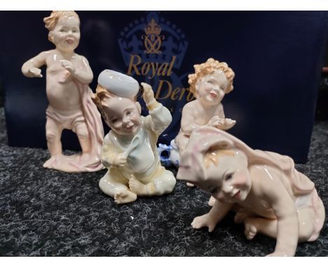 Set of 4 Royal doulton baby figures includes first steps , what fun etc 