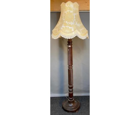 19th century carved floor standing lamp. comes with shade [180cm high] 