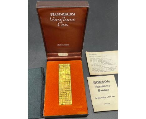 Vintage Ronson Varaflame gas lighter with original box and instruction manual. 