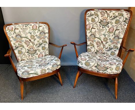 Vintage 'His and Her' Ercol armchairs with original cushions. 