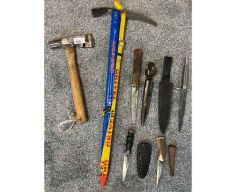 A Lot of small hunting knives with scabbards. Includes military style knife and frog. Italian made ice pick and old hammer ax