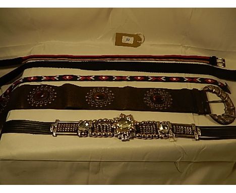 A collection of 5 belts some vintage - to include a Jewelled and beaded belt. 