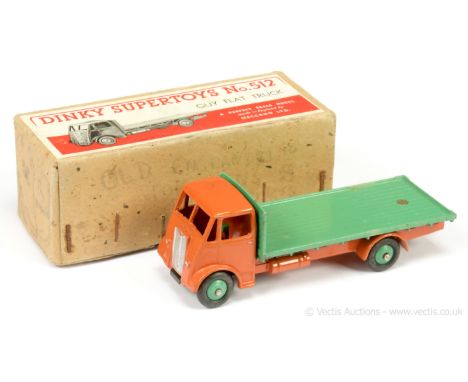 Dinky 512 Guy (Type 1) Flat Truck - burnt orange cab and chassis, mid-green back and ridged hubs with smooth tyres, silver tr