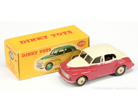 Dinky 159 Morris Oxford Saloon - two-tone off white, maroon, silver trim, light beige ridged hubs with smooth tyres (small ba