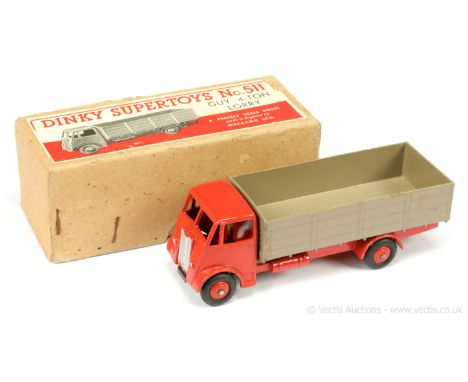 Dinky 511 Guy (Type 1) 4-ton Lorry - red including cab, chassis and ridged hubs with smooth tyres, fawn back, silver trim, to