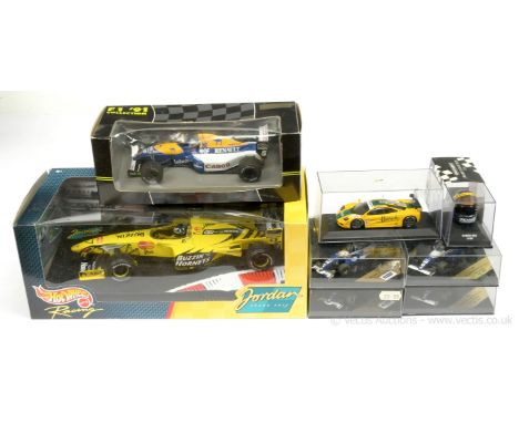 A group of Racing Cars to include Hot Wheels (Mattel) - Jordan 199 "Damon Hill" - (1/18th scale) - Mint in an Excellent windo