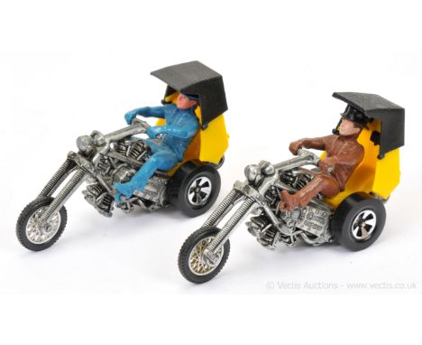 Hot Wheels (Mattel) RRRumblers - a pair (1) Revolution - yellow and black plastics, brown figure with black hat and (2) same 