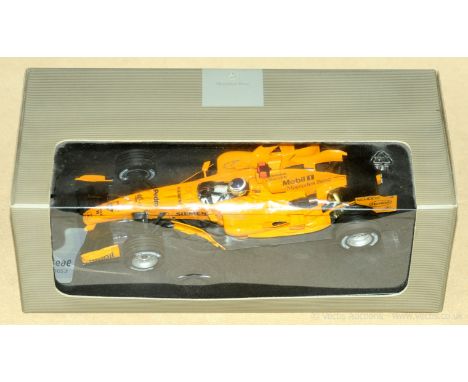 Minichamps (1/18th scale) Formula 1 Mercedes Racing Car "De La Rosa" - finished in orange, black - this example is Mint in a 