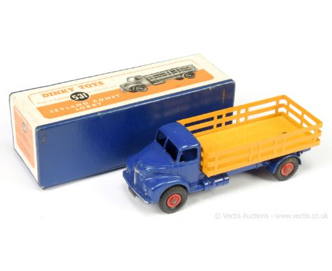 Dinky 531 Leyland Comet Lorry - blue cab and chassis, yellow stake back, silver trim, with tow hook, red Supertoy hubs with b