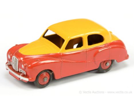 Dinky 161 Austin Somerset Saloon - two-tone yellow, red including ridged hubs with smooth tyres, silver trim - Good Plus stil