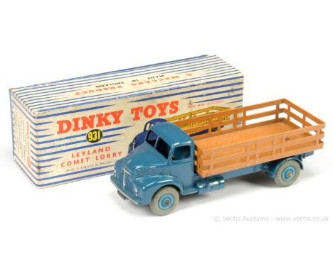 Dinky 931 Leyland Comet Lorry - finished in blue (Saxe) cab and chassis, brown stake back, mid-blue Supertoy hubs with grey t