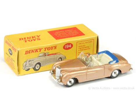 Dinky 194 Bentley Coupe - metallic light brown, cream interior with blue tonneau, figure driver, chrome trim and spun hubs wi
