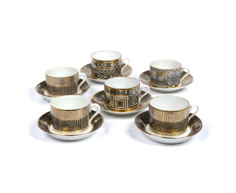 Piero Fornasetti (Milan, 1913 - 1988) Six "Greca" cups and saucers black and gilt classical decoration factory marks to base 