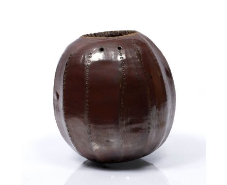 Studio Pottery  Ceramic sculpture  naturalistic form, circular incised pattern, red glaze  26cm high 