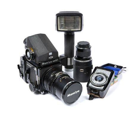 Mamiya (Japan) Medium-format RB67 Pro S camera 250mm f/4.5 lens, 120 Roll film holder and prism finder together with accessor