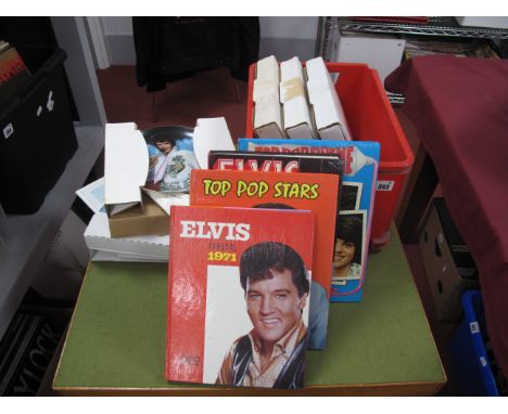 Elvis Presley Memorabilia, five plates produced by The Bradford Exchange and four books.