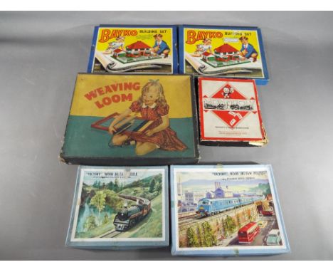 Bayko - two Bayko building sets, both boxed and one with related ephemera and a Waddington limited edition Monopoly set, two 