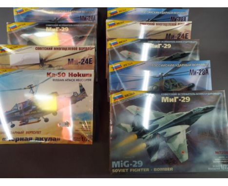 Zvezda Kits - 9 boxed 1:72 scale model kits, Russian military aircraft and helicopters, all appear mint in box, predominantly