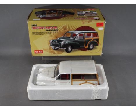 Sun Star - A boxed Limited Edition 1:12th scale Sun Star Morris Minor 1000 Traveller. The model is in Cream with red interior