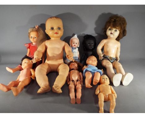 Vintage Dolls - a mixed lot of vintage dolls to include a Pedigree doll with walking motion, turning head and voice box, a Ro