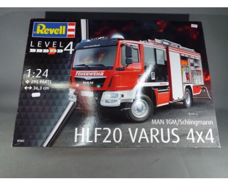 Revell - a 1:24 scale boxed kit, MAN TGM/Schlingmann HLF20 Varus 4x4 fire tender, level 4 # 07452, in factory sealed original