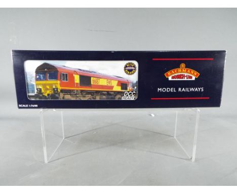 Bachmann Branch Line - an OO gauge DCC ready, class 66 diesel EWS locomotive, op no 66135, # 32-725, appears mint in box