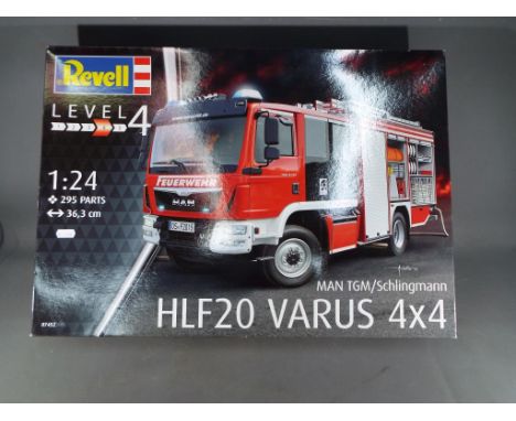 Revell - a 1:24 scale boxed kit, MAN TGM/Schlingmann HLF20 Varus 4x4 fire tender, level 4 # 07452, in factory sealed original