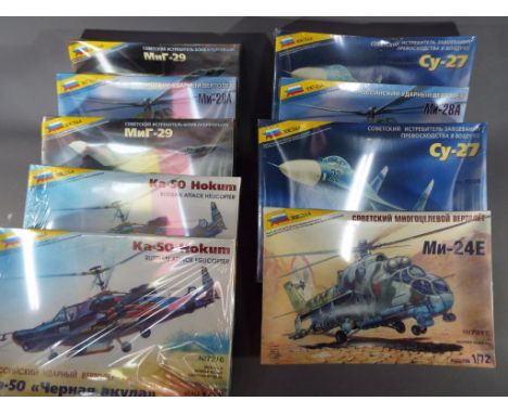 Zvezda Kits - 9 boxed 1:72 scale model kits, Russian military aircraft and helicopters, all appear mint in box, predominantly