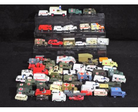 Matchbox; Wiking; Majorette and others. In excess of 40 predominately 1:64 scale diecast, plastic and tinplate model ambulanc