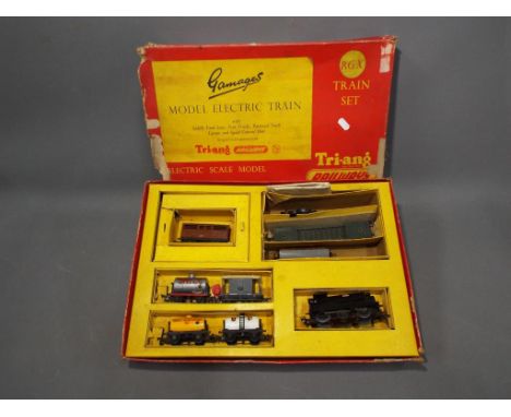 Triang - A boxed Triang 'Gamages' RGX Electric Train Set. The set contains a 0-6-0 Tank engine Op.No.748 in Black Livery; six