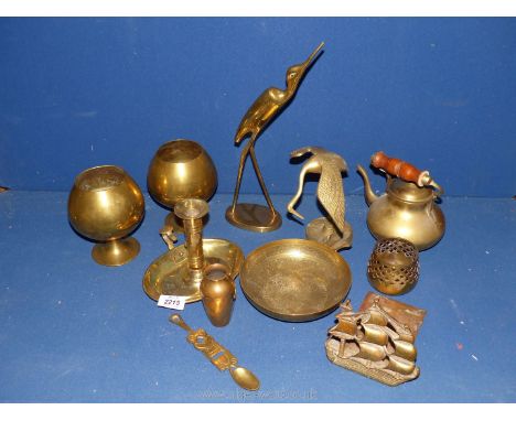 A box of brass ornaments including teapot, goblet, birds etc.