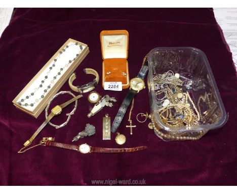 A quantity of costume jewellery including chains, wristwatches, rings, etc.